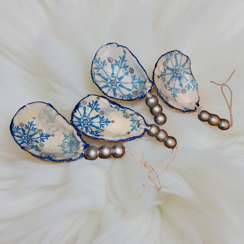Oyster Shell Ornaments With Blue and White Snowflakes